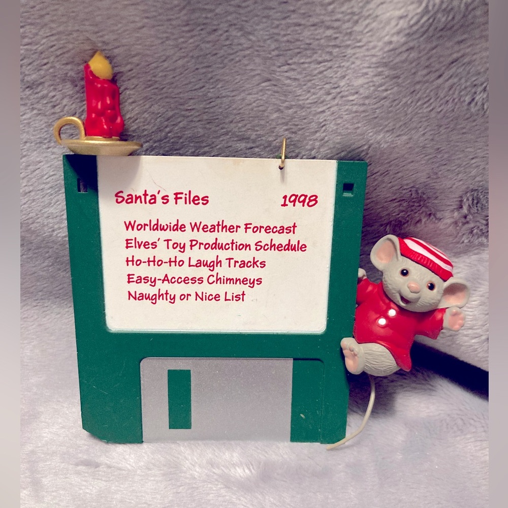 1998 Hallmark Keepsake Ornament 
Checking Santa’s Files